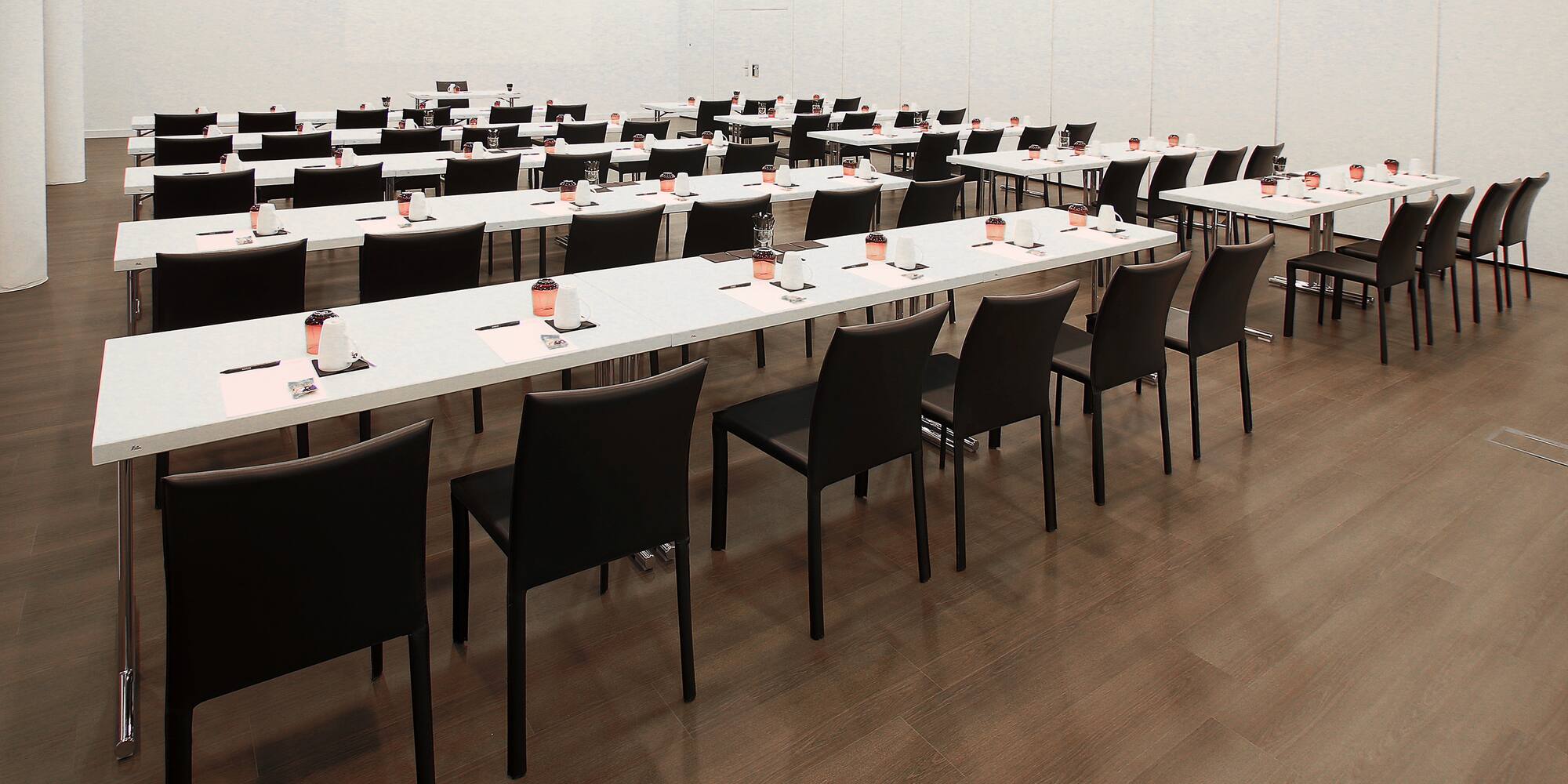 a room with tables and chairs