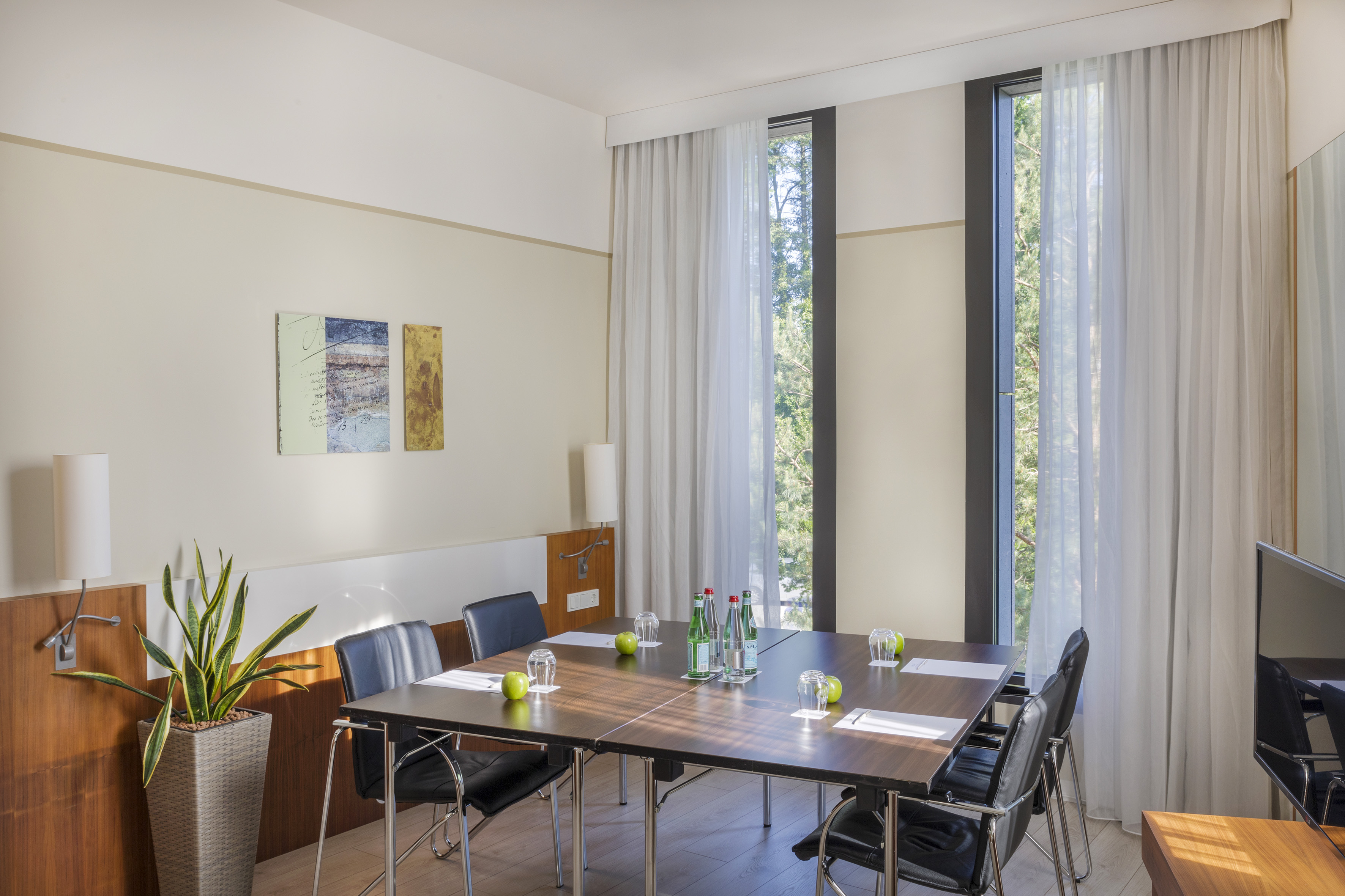 a room with a table and chairs