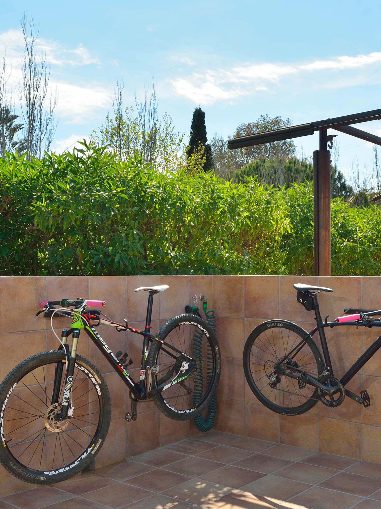two bicycles on a wall