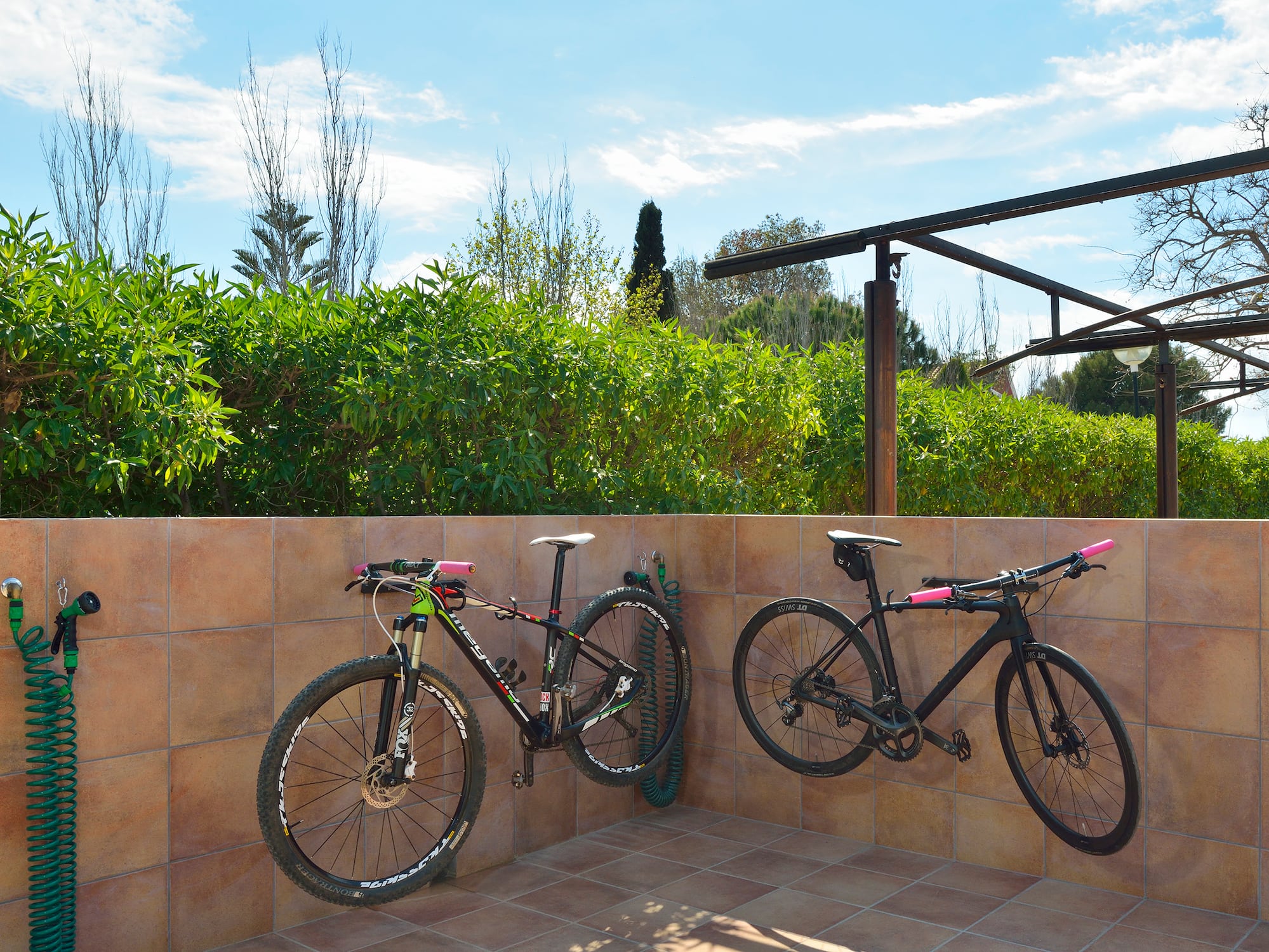 two bicycles on a wall