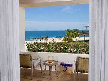 a view of the ocean from a balcony