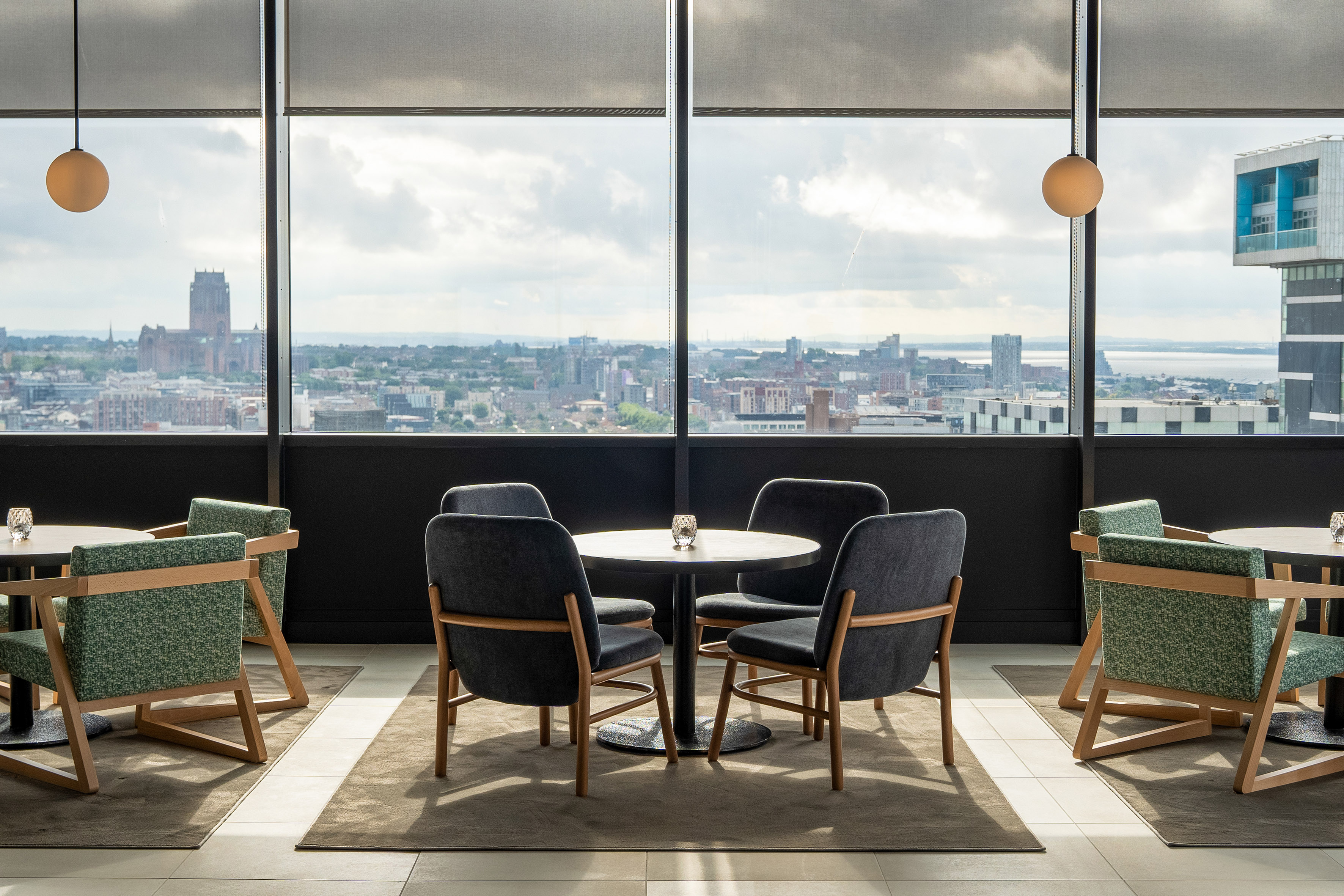Contemporary bar/restaurant overlooking Liverpool cityscape and cathedral.