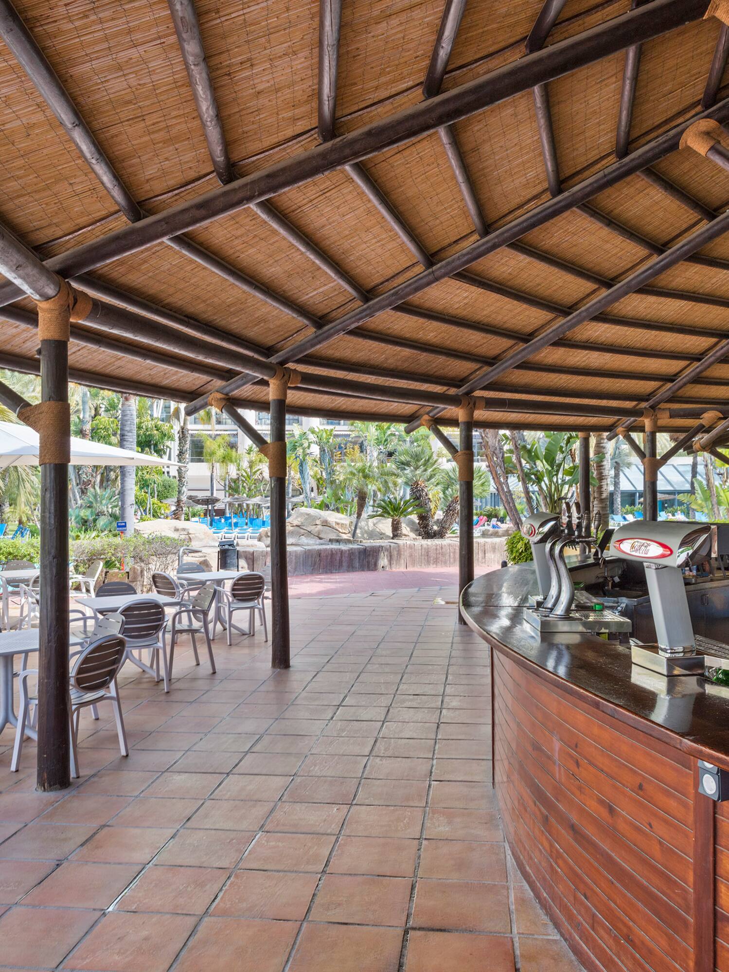 a restaurant with tables and chairs