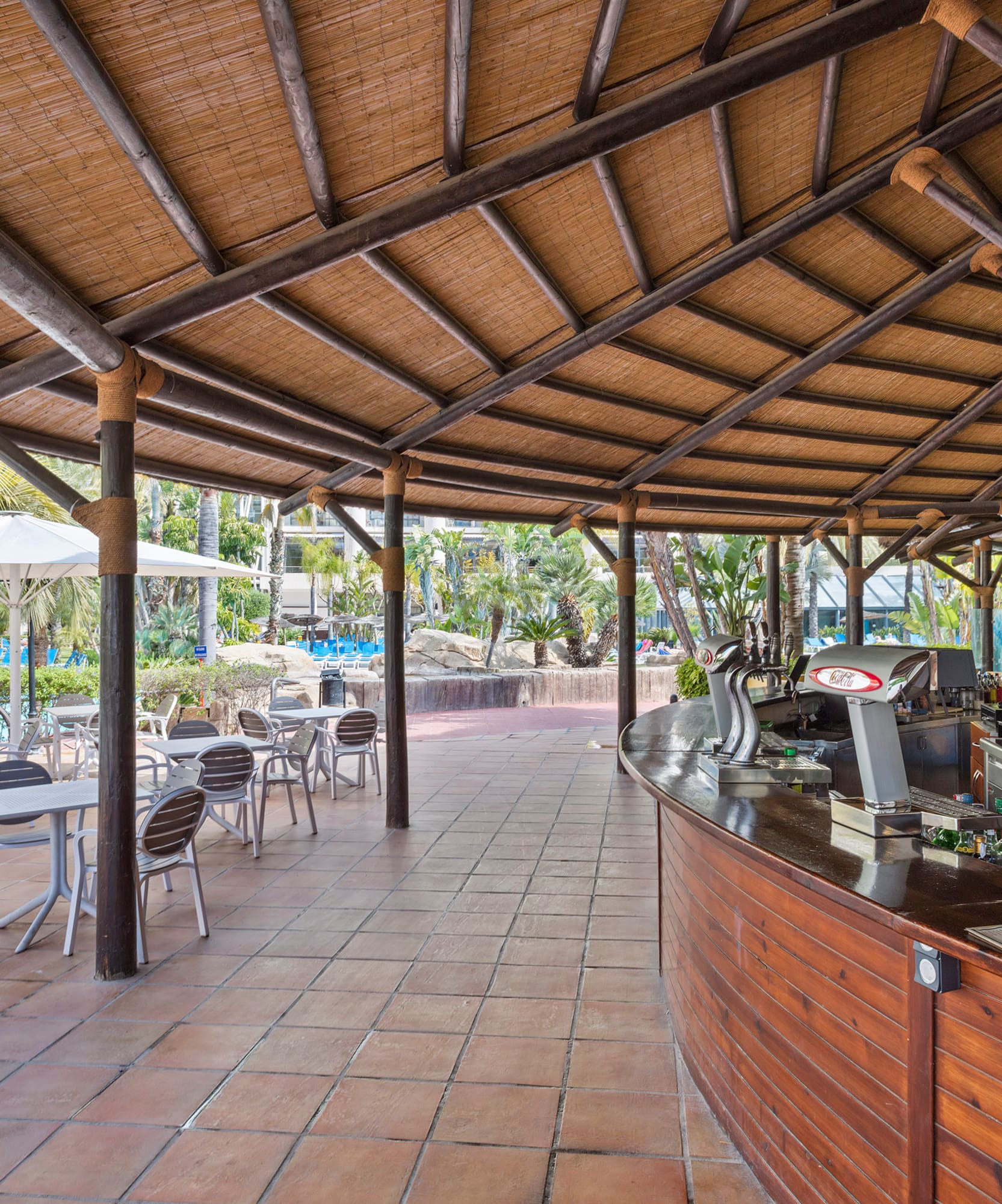 a restaurant with tables and chairs