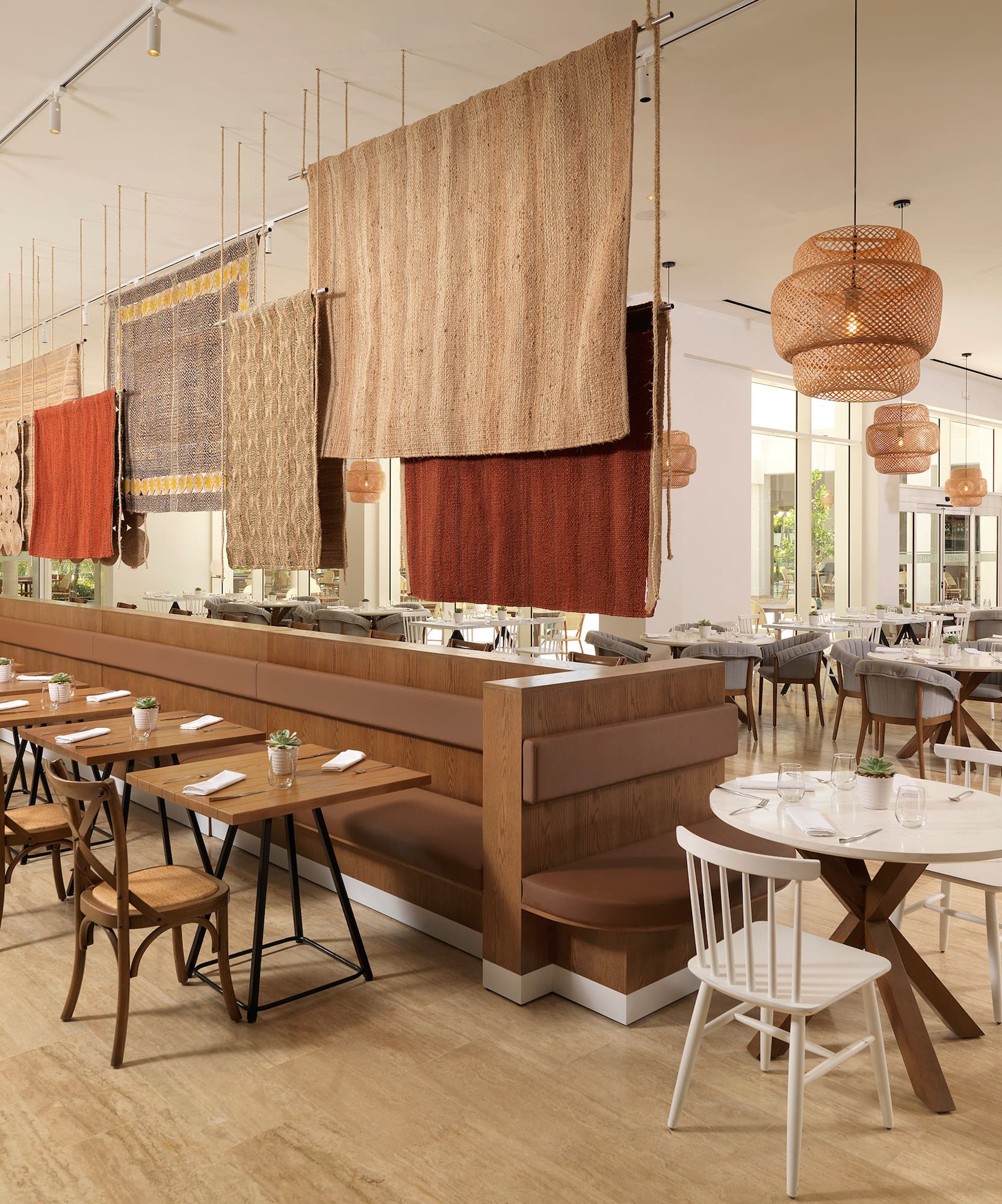 a restaurant with tables and chairs