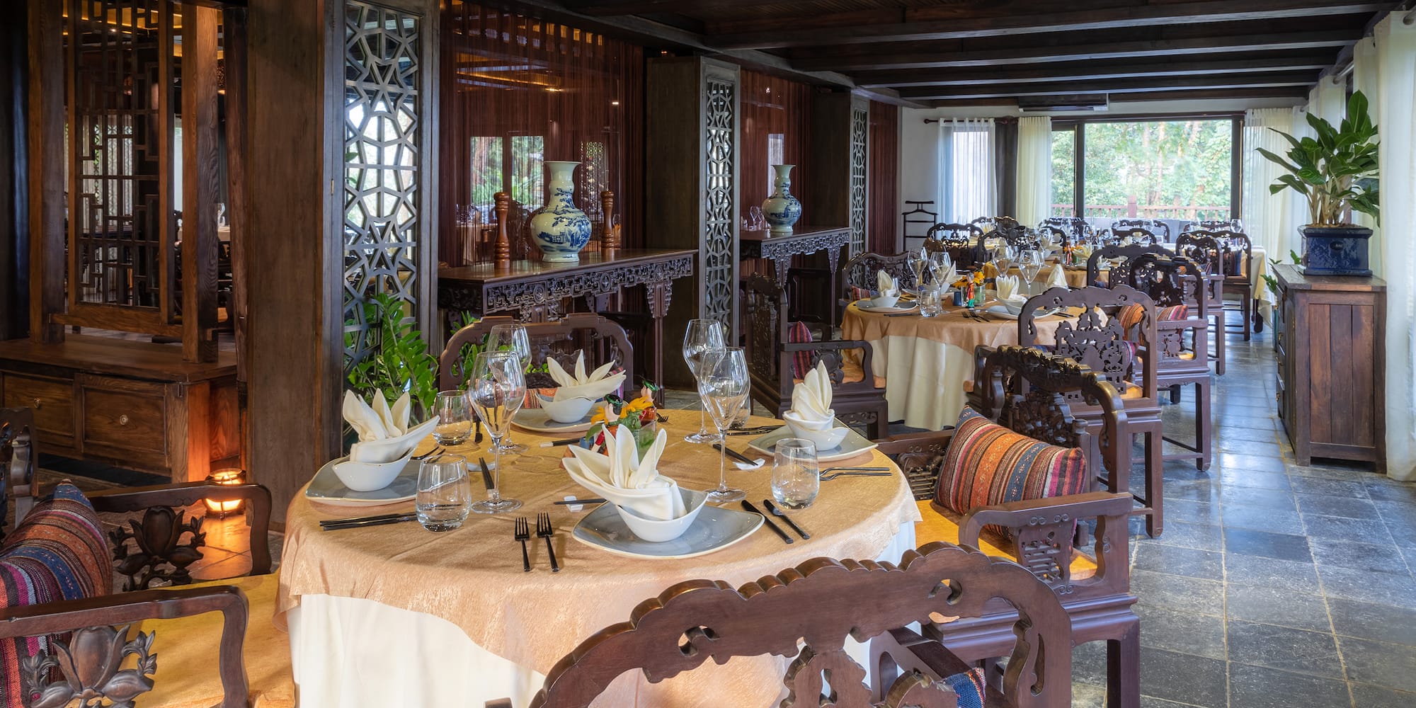 a restaurant with tables and chairs