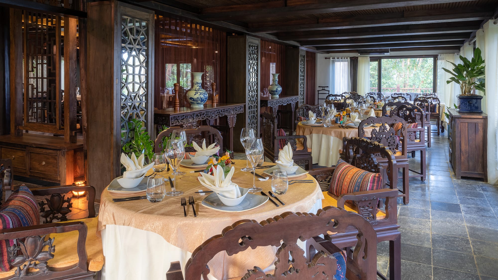 a restaurant with tables and chairs