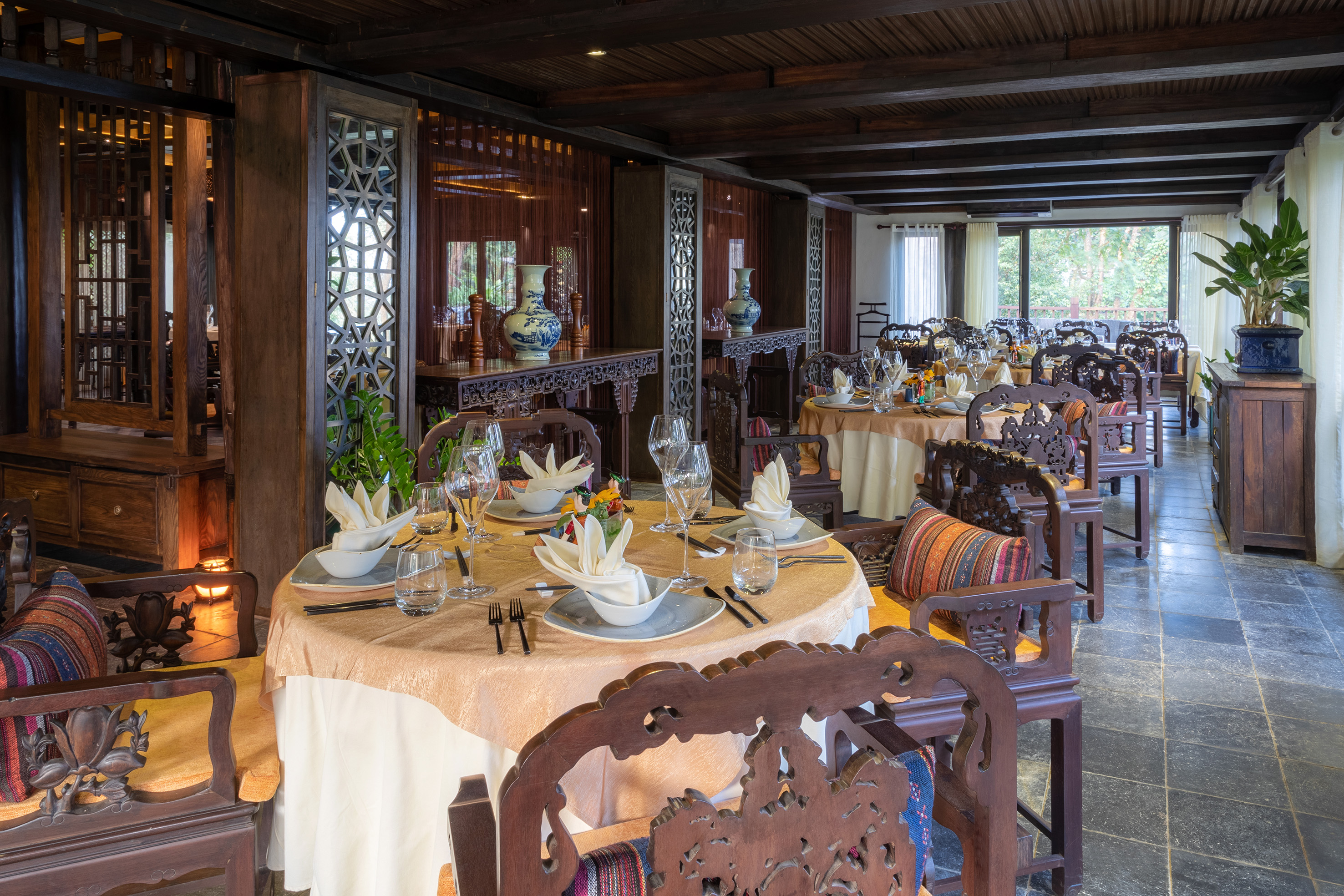 a restaurant with tables and chairs