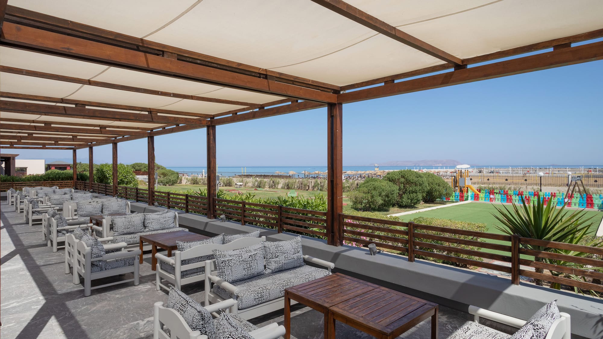 a patio with chairs and tables