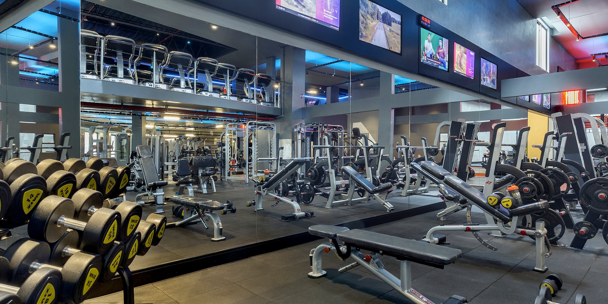 a large gym with several equipment