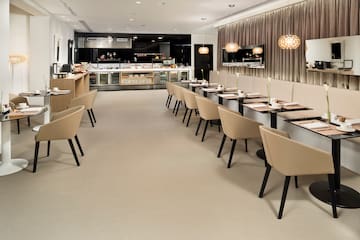 a room with tables and chairs