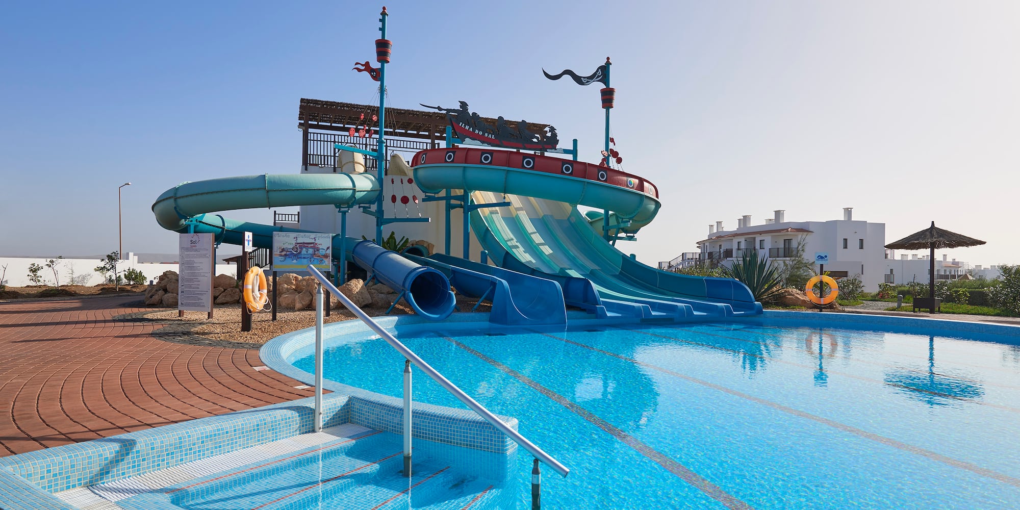 a water slide in a pool