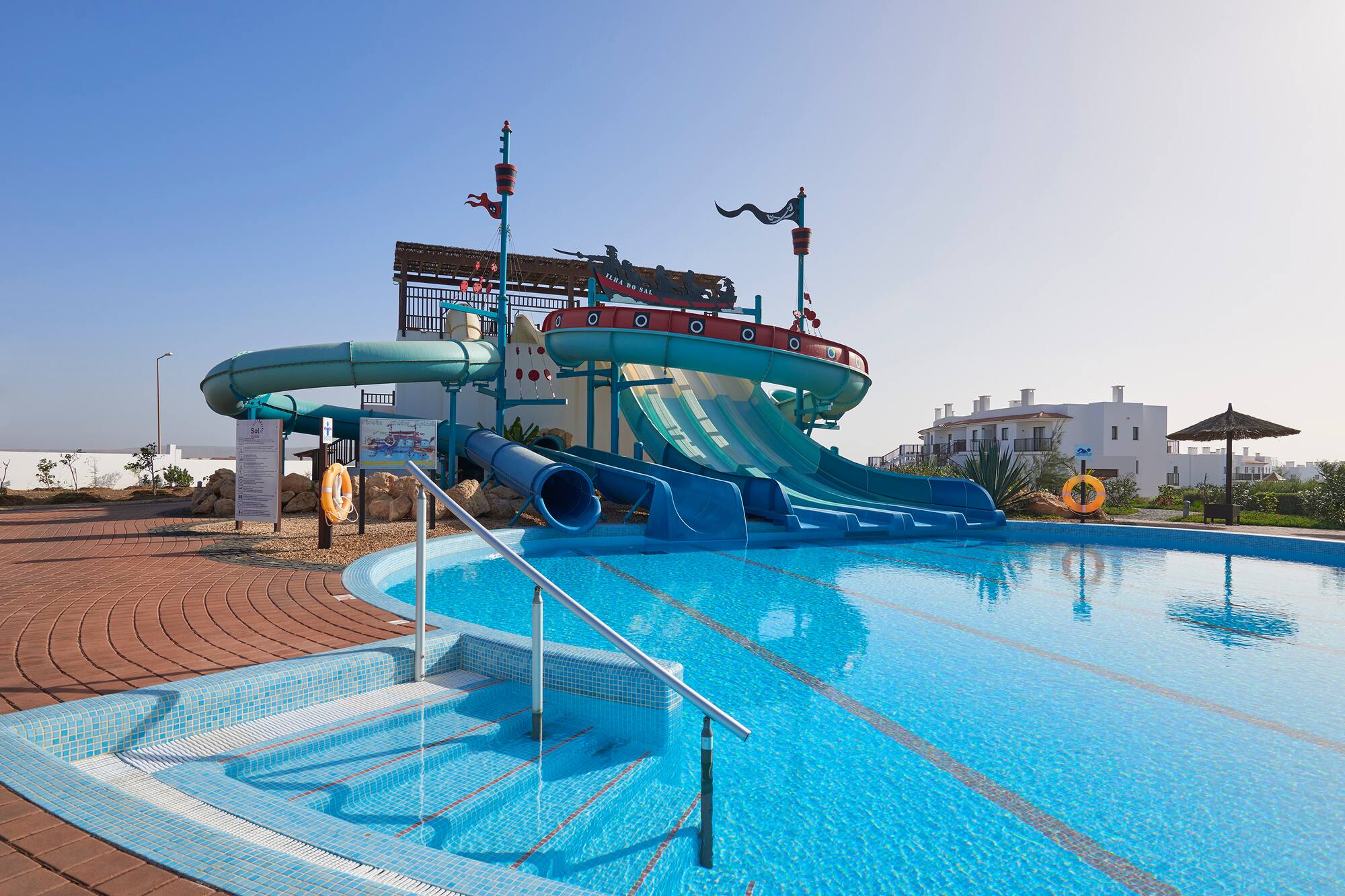a water slide in a pool