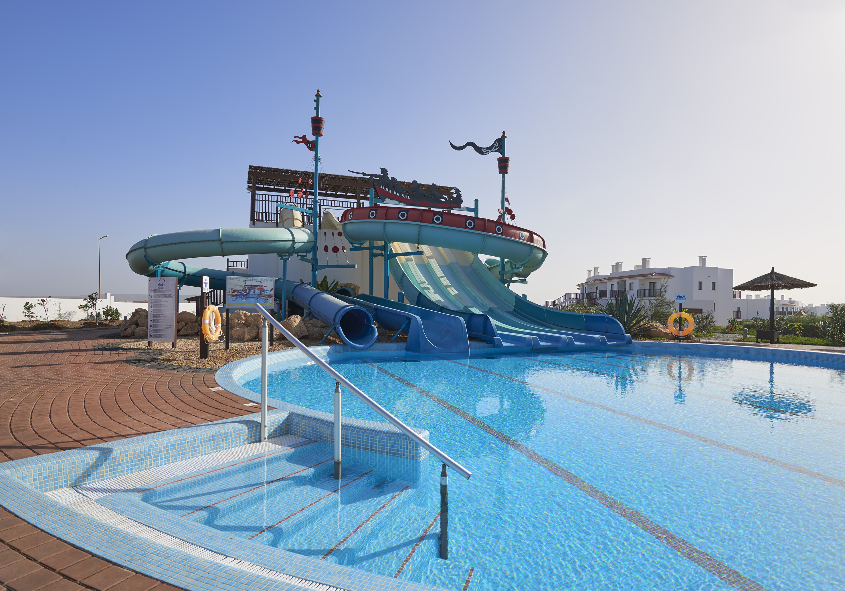 a water slide in a pool