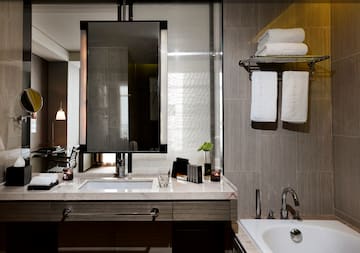 a bathroom with a mirror and sink