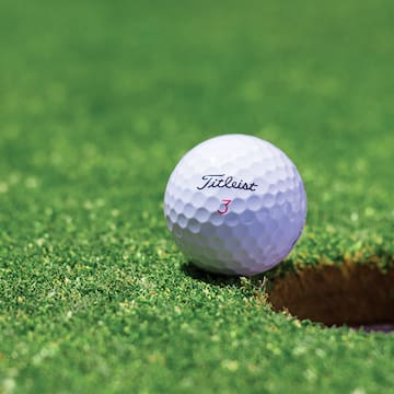a golf ball on the ground