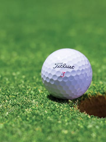 a golf ball on the ground