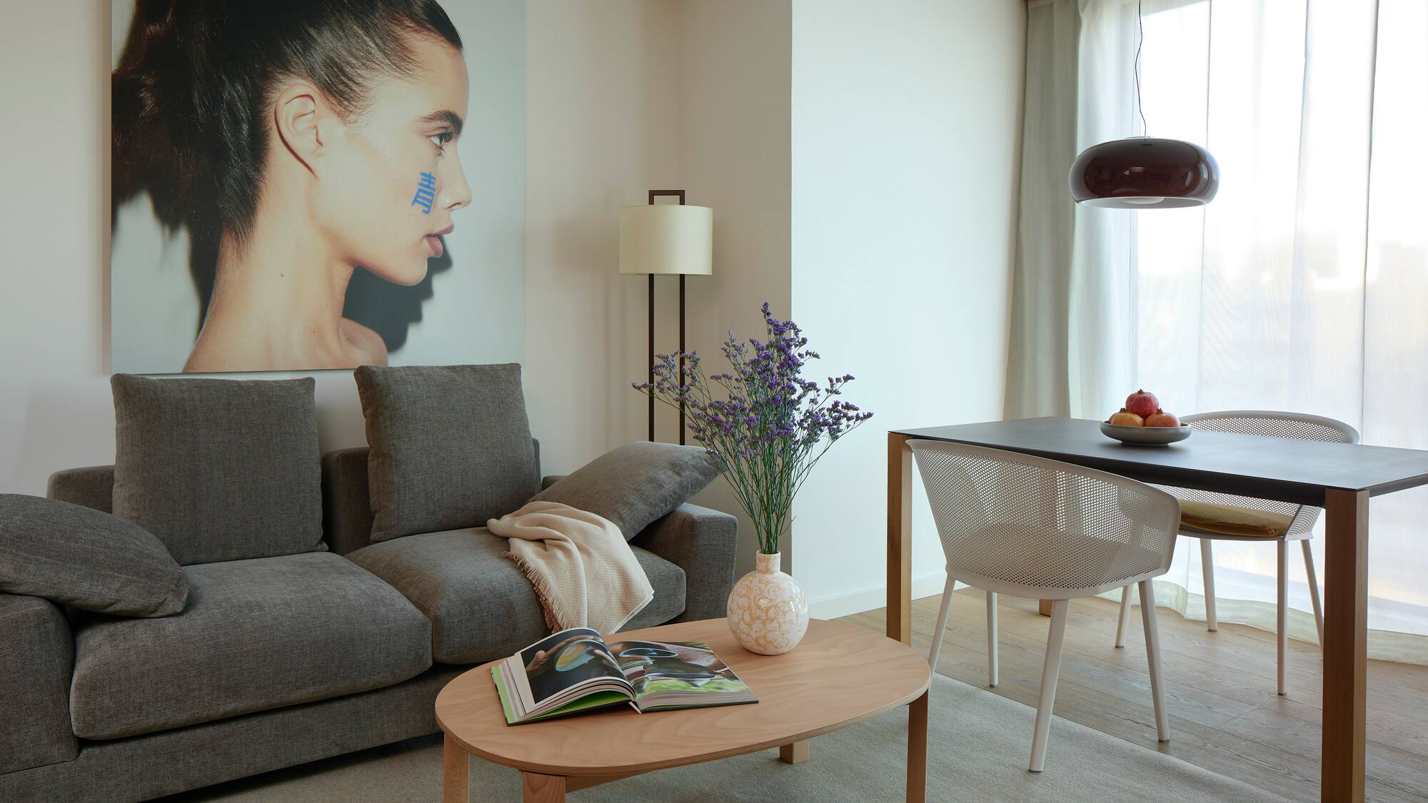 a living room with a couch and table