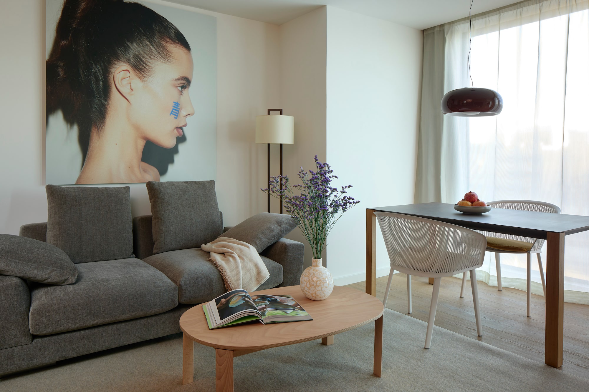 a living room with a couch and table