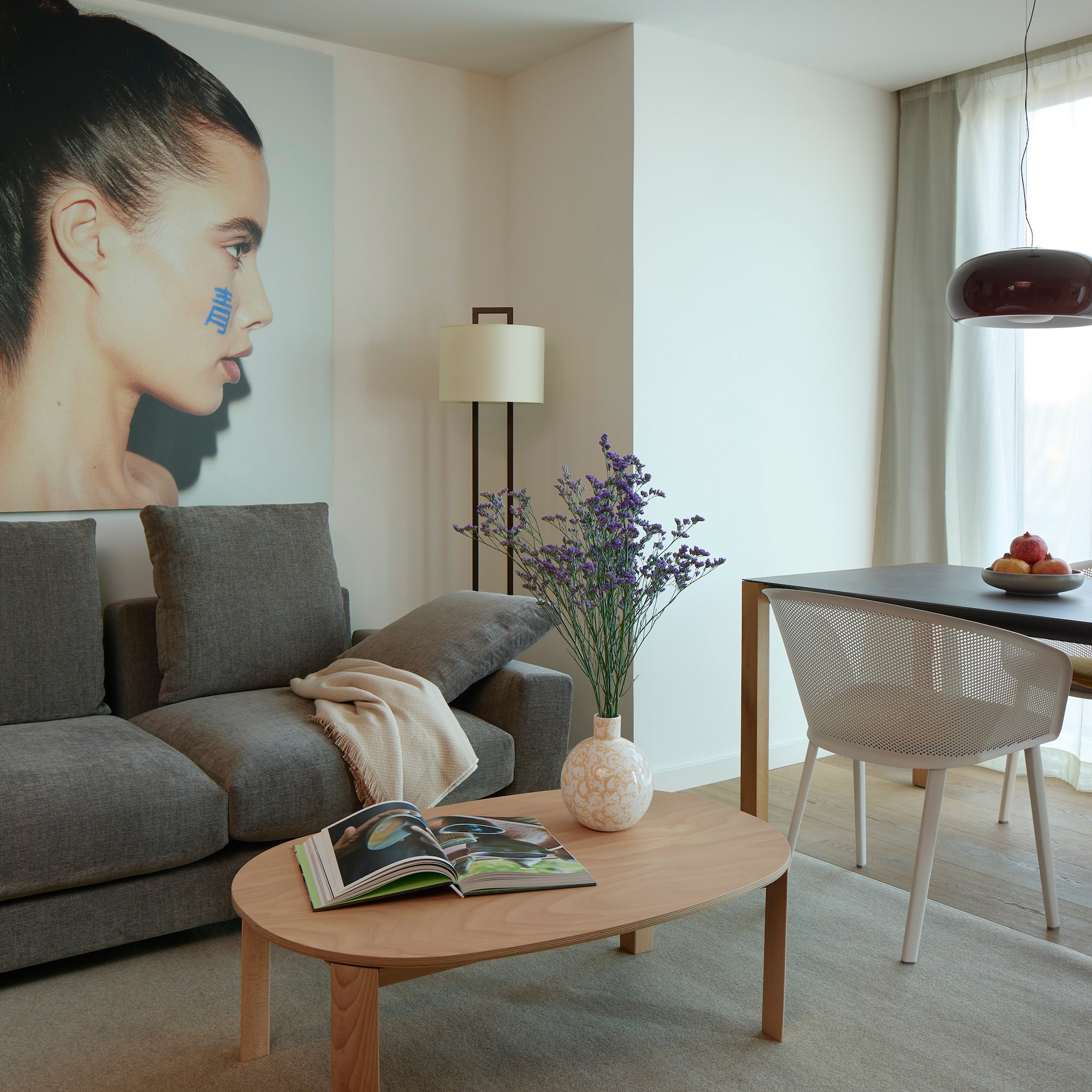 a living room with a couch and table