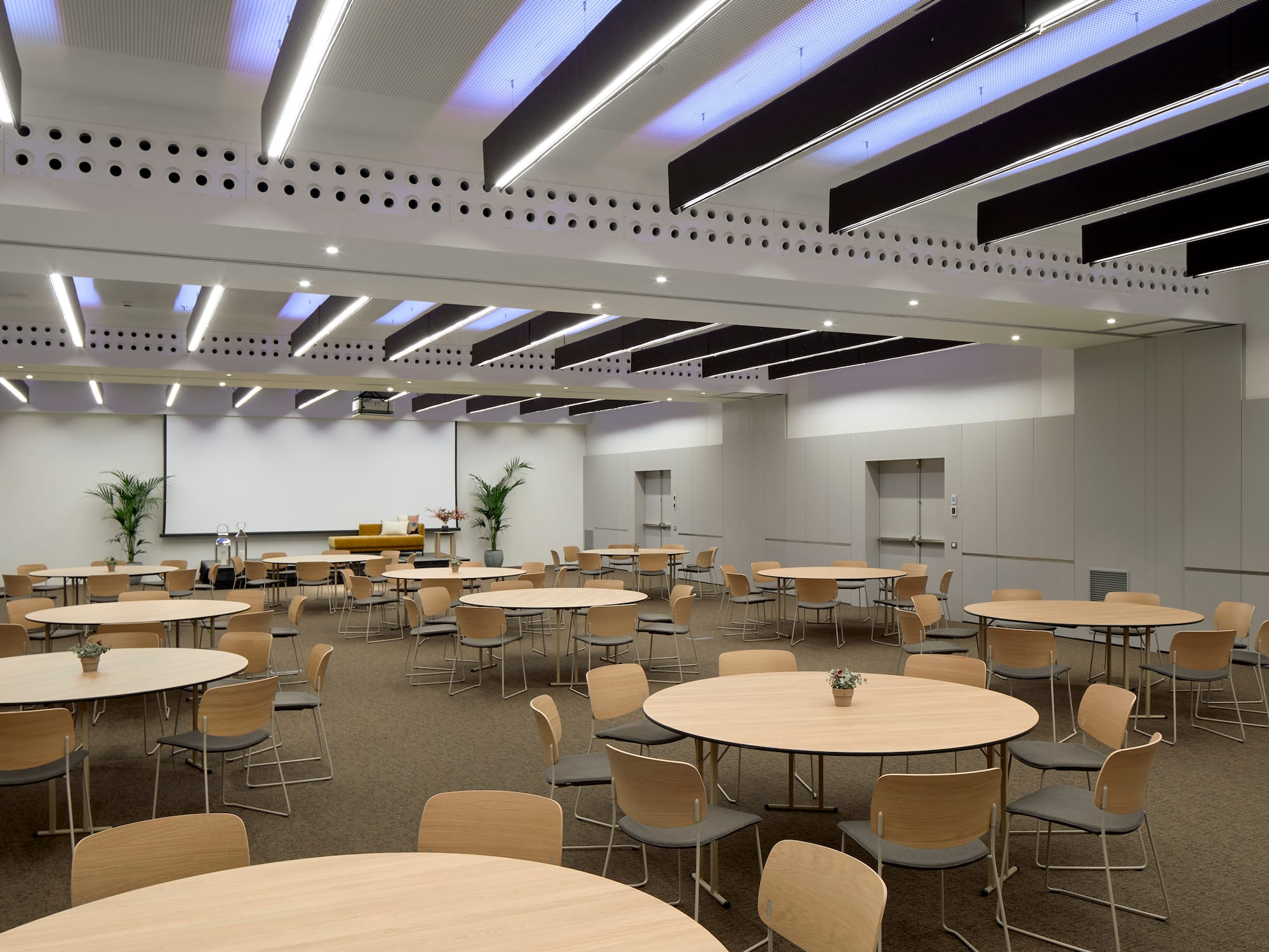 a room with tables and chairs