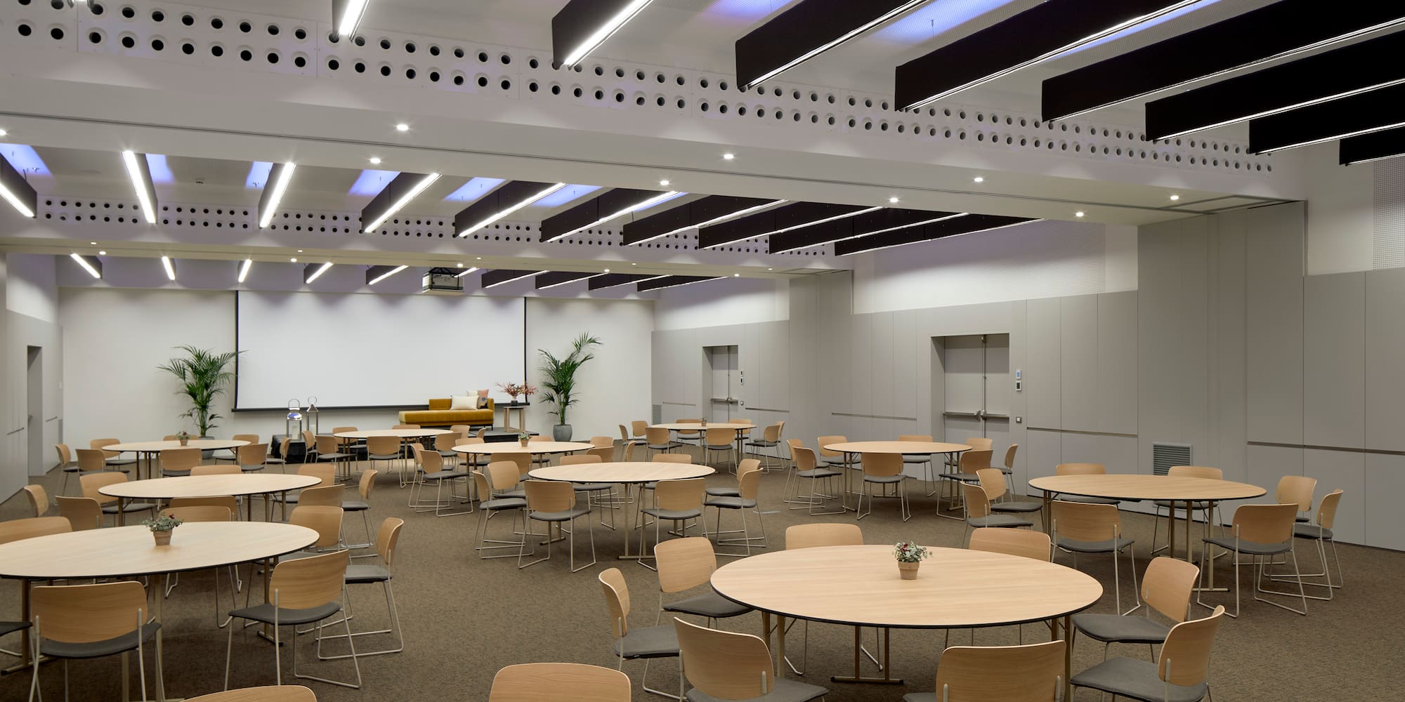 a room with tables and chairs