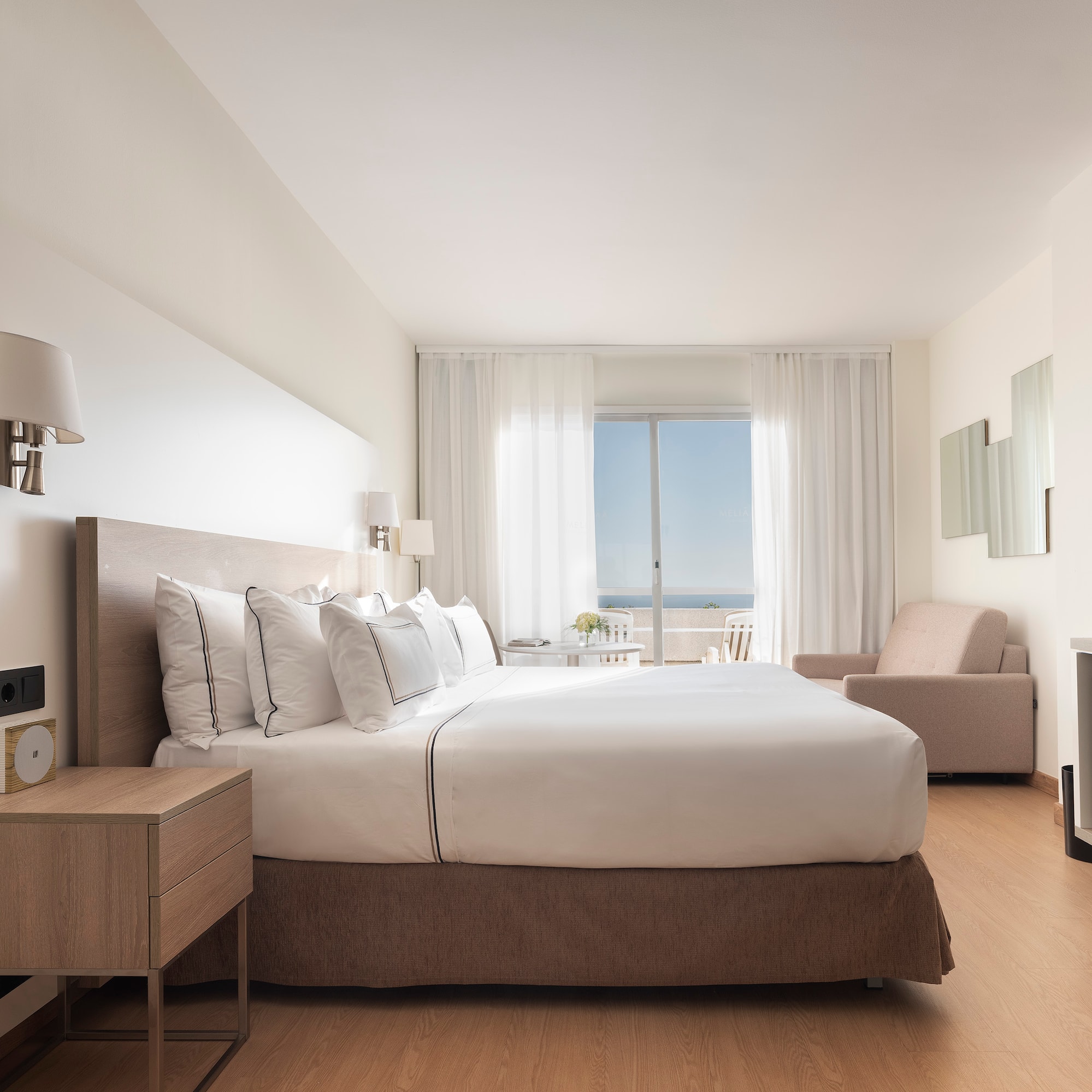 a bedroom with a bed and a fireplace