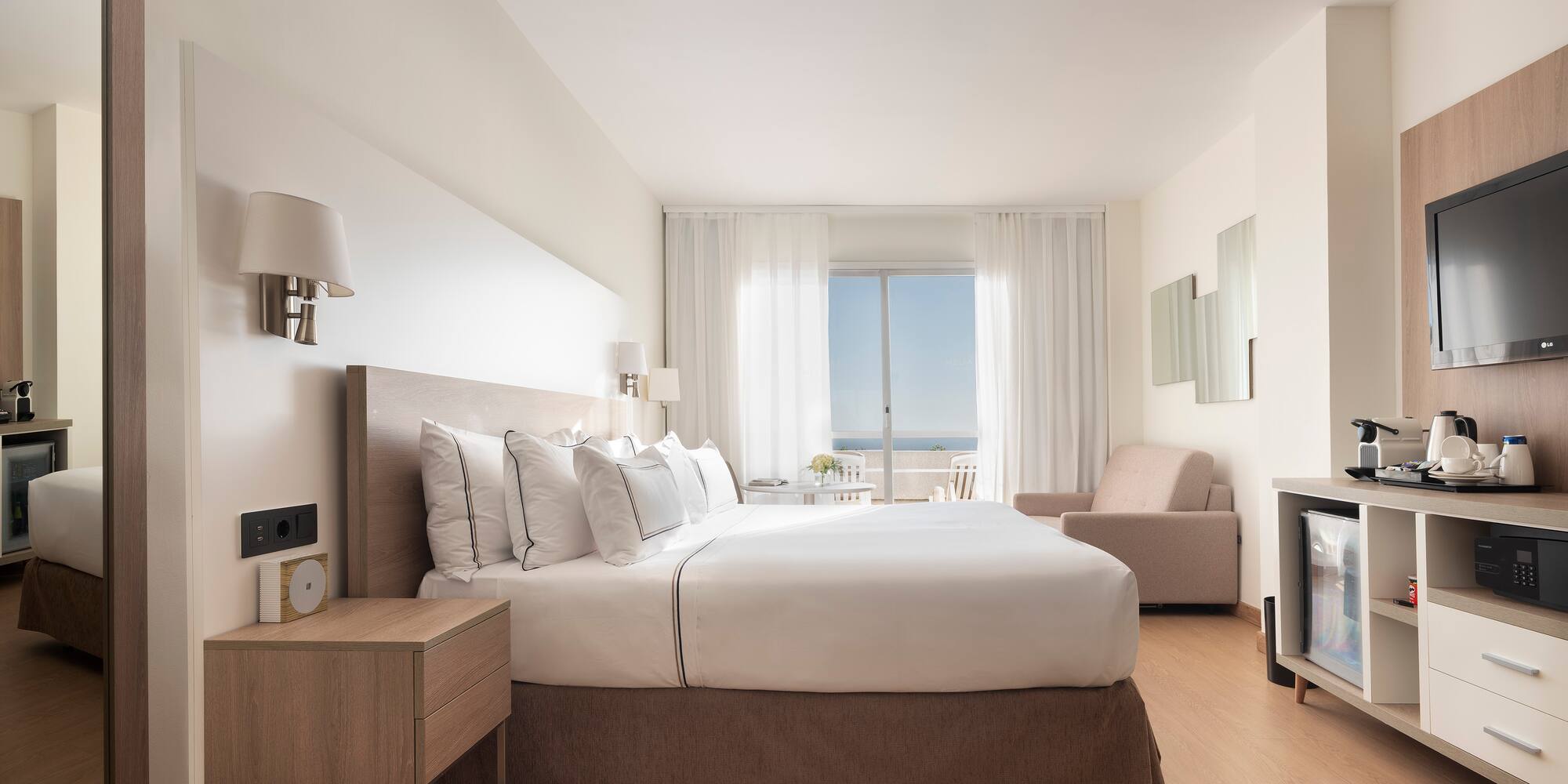 a bedroom with a bed and a fireplace