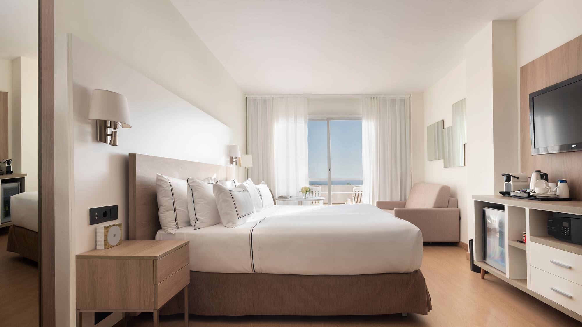 a bedroom with a bed and a fireplace