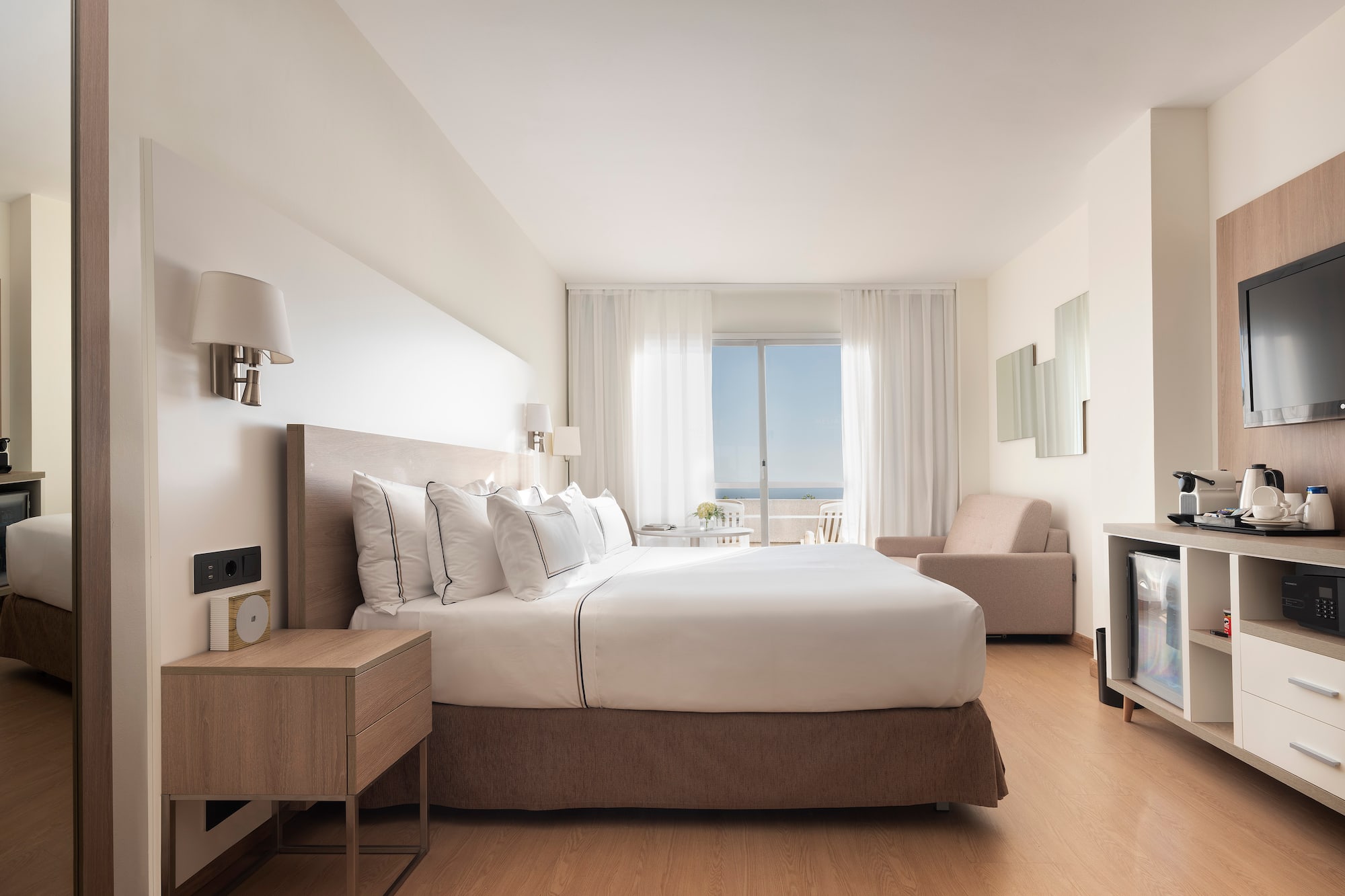 a bedroom with a bed and a fireplace