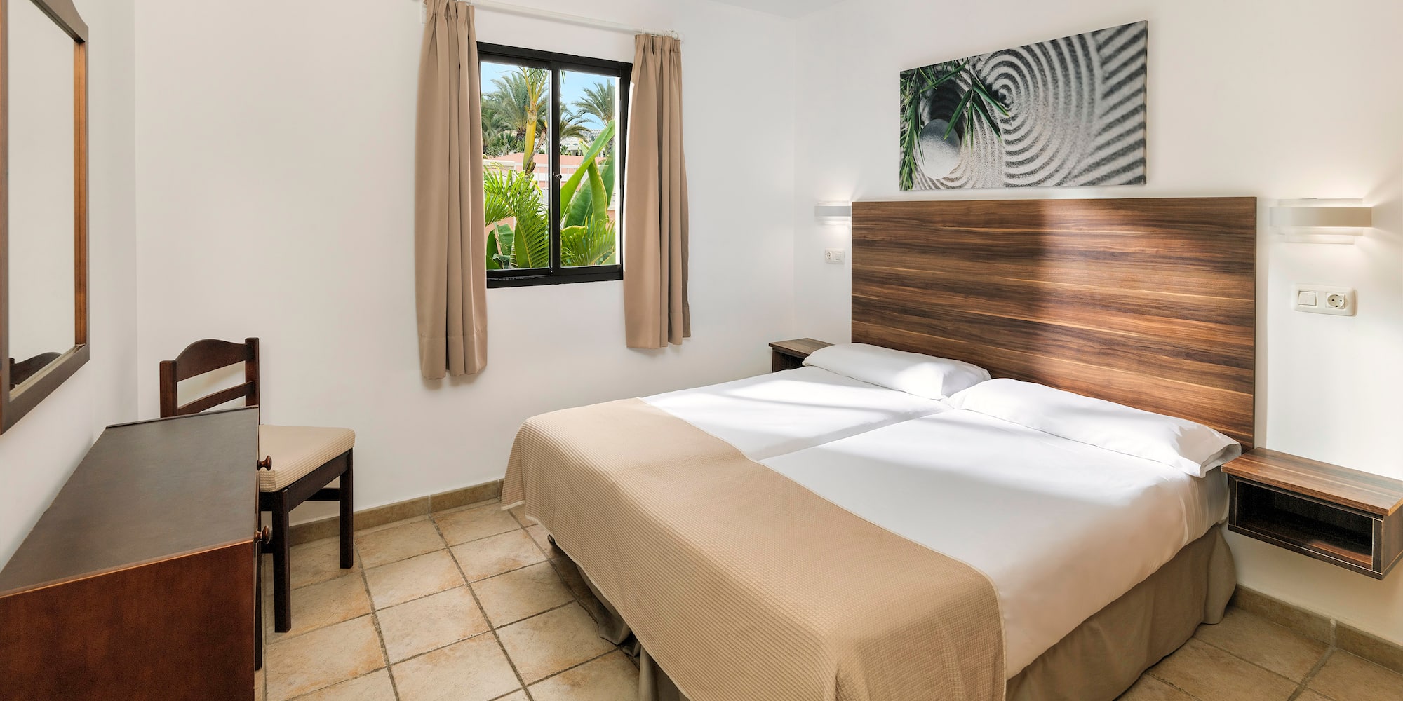 a room with a bed and a window