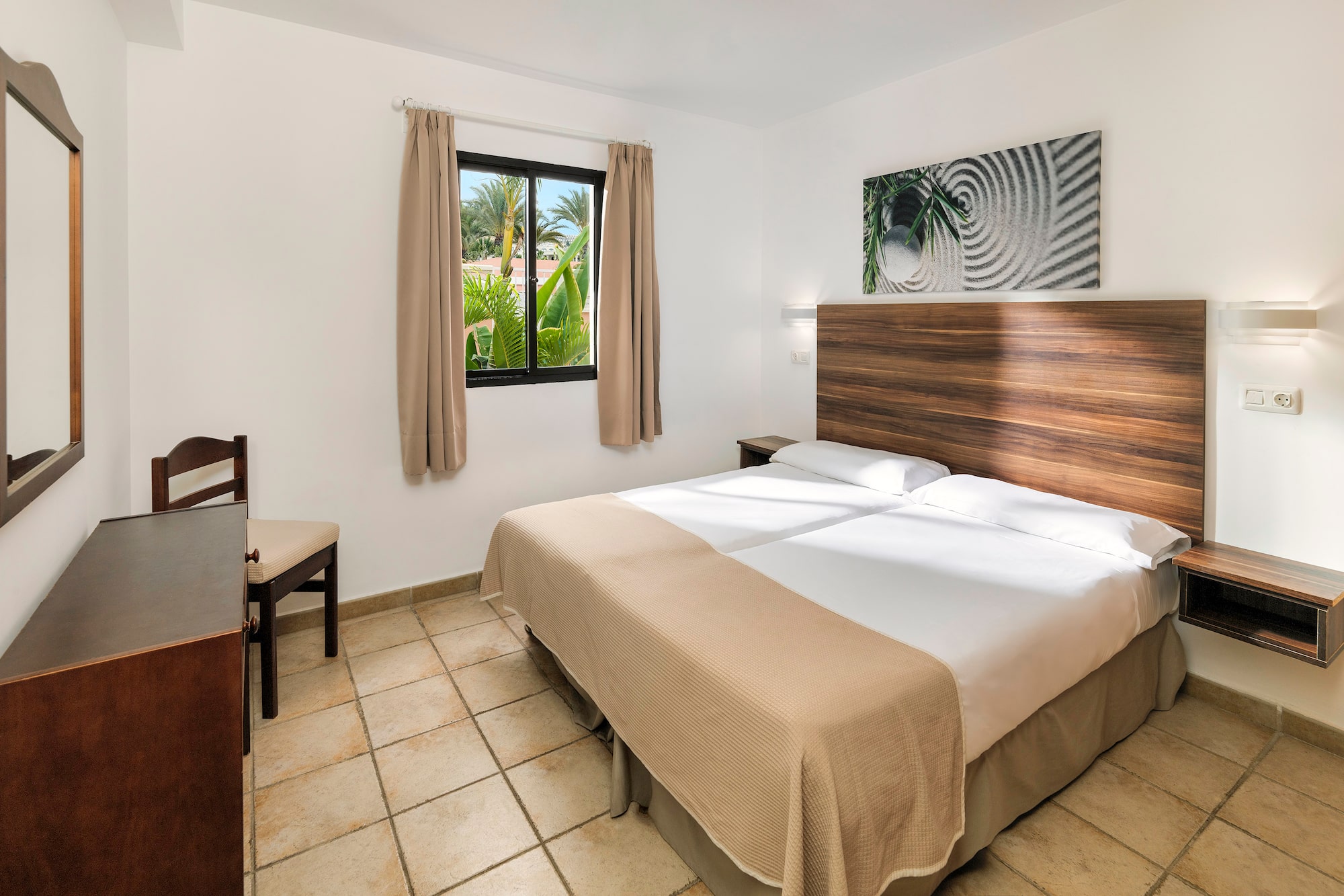 a room with a bed and a window