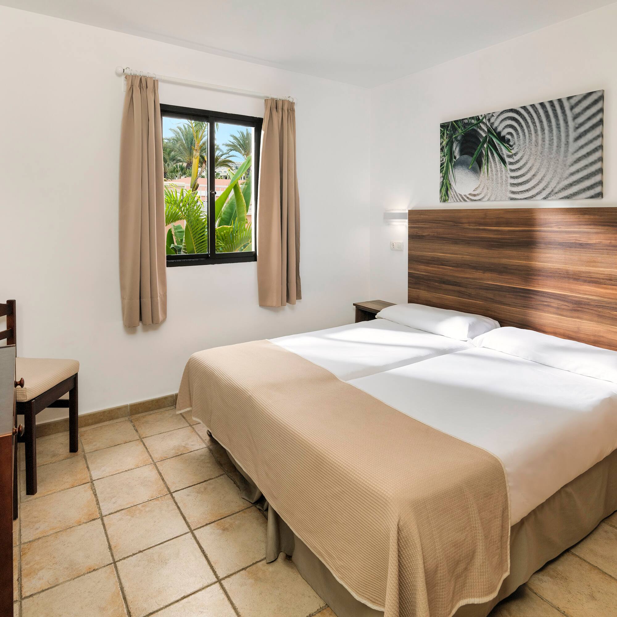 a room with a bed and a window