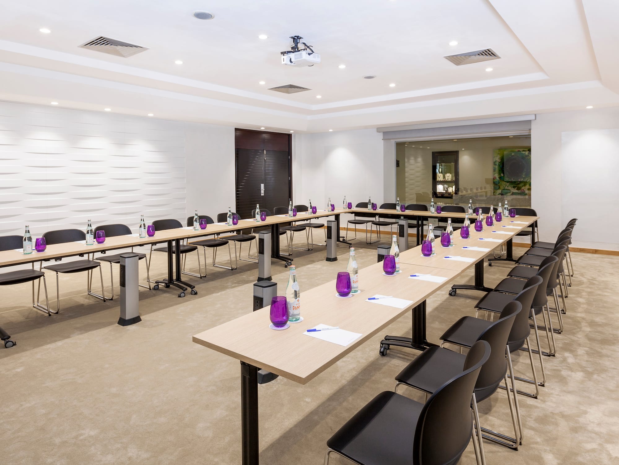 a room with tables and chairs