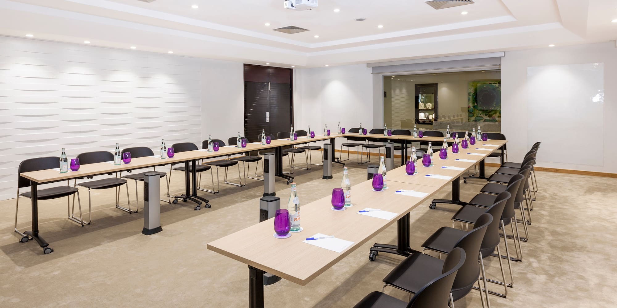 a room with tables and chairs