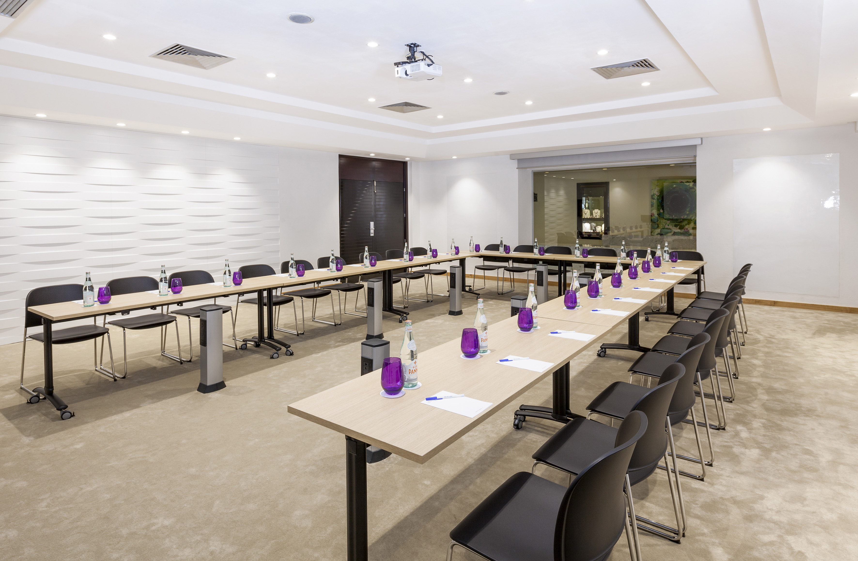 a room with tables and chairs