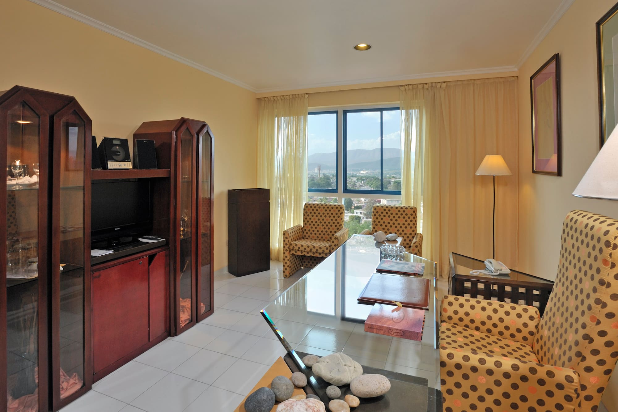 a room with a television and a table