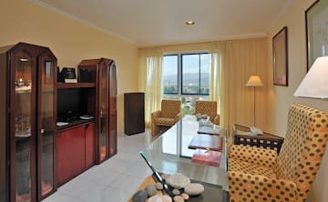 a room with a television and a table