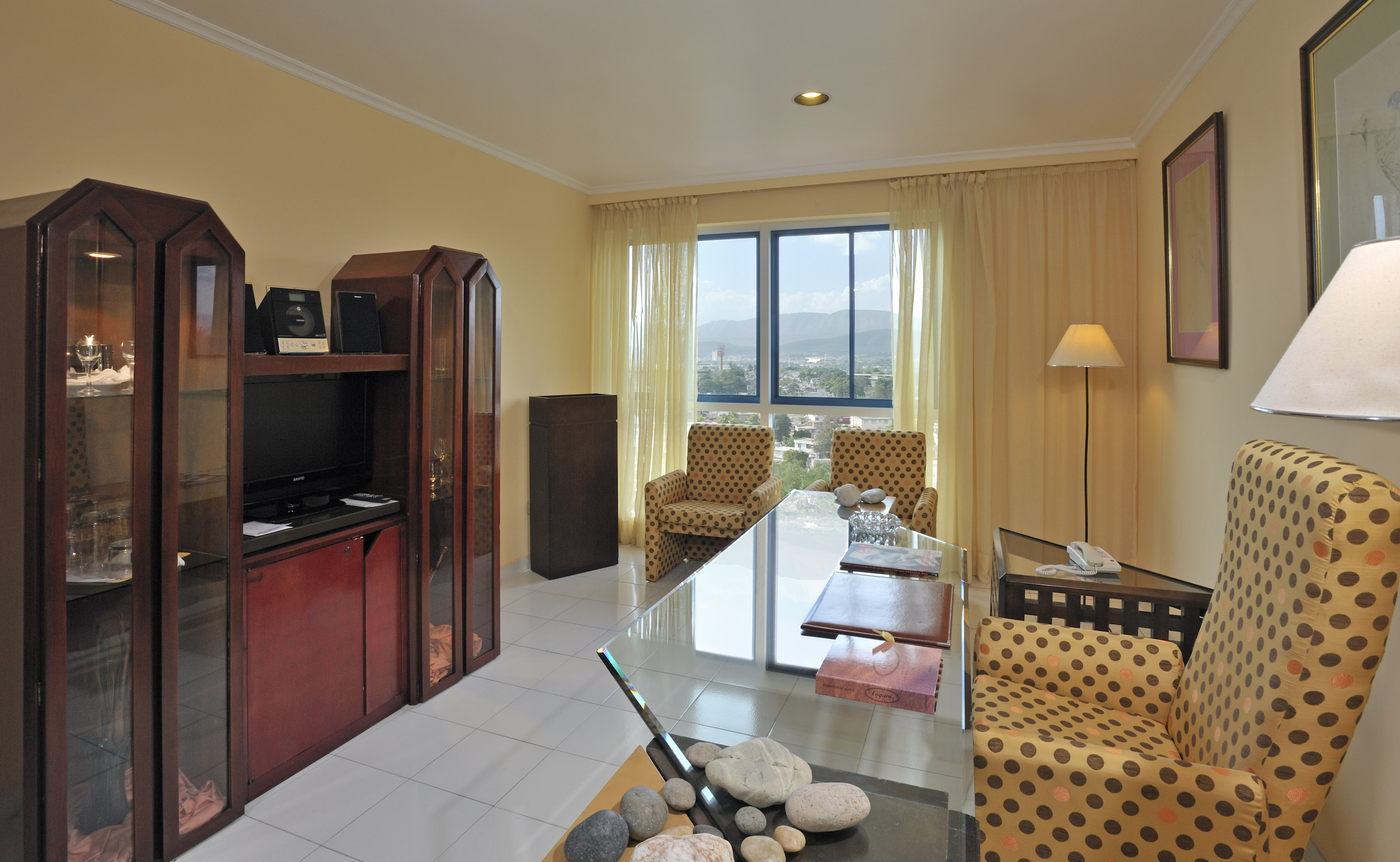 a room with a television and a table