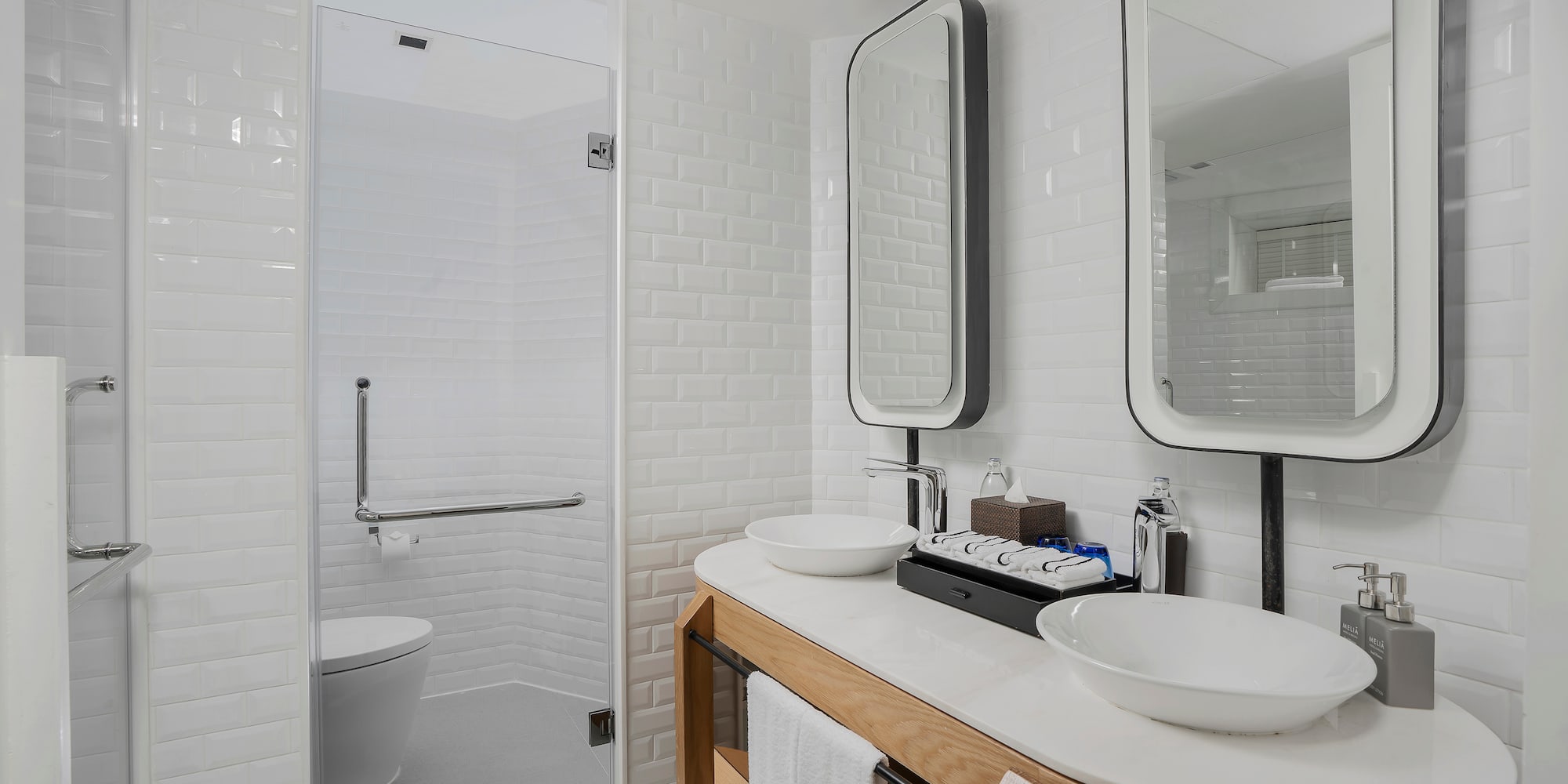 a bathroom with a shower and sink
