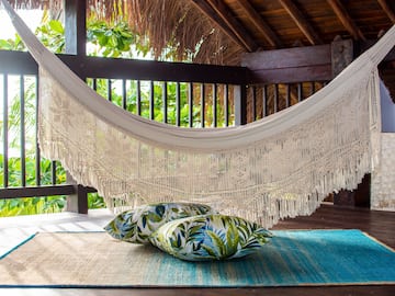 a hammock on a rug