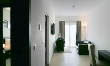 a room with a couch and a door