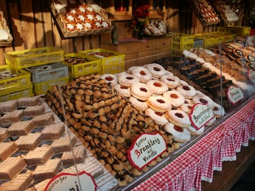 a display of pastries and cookies