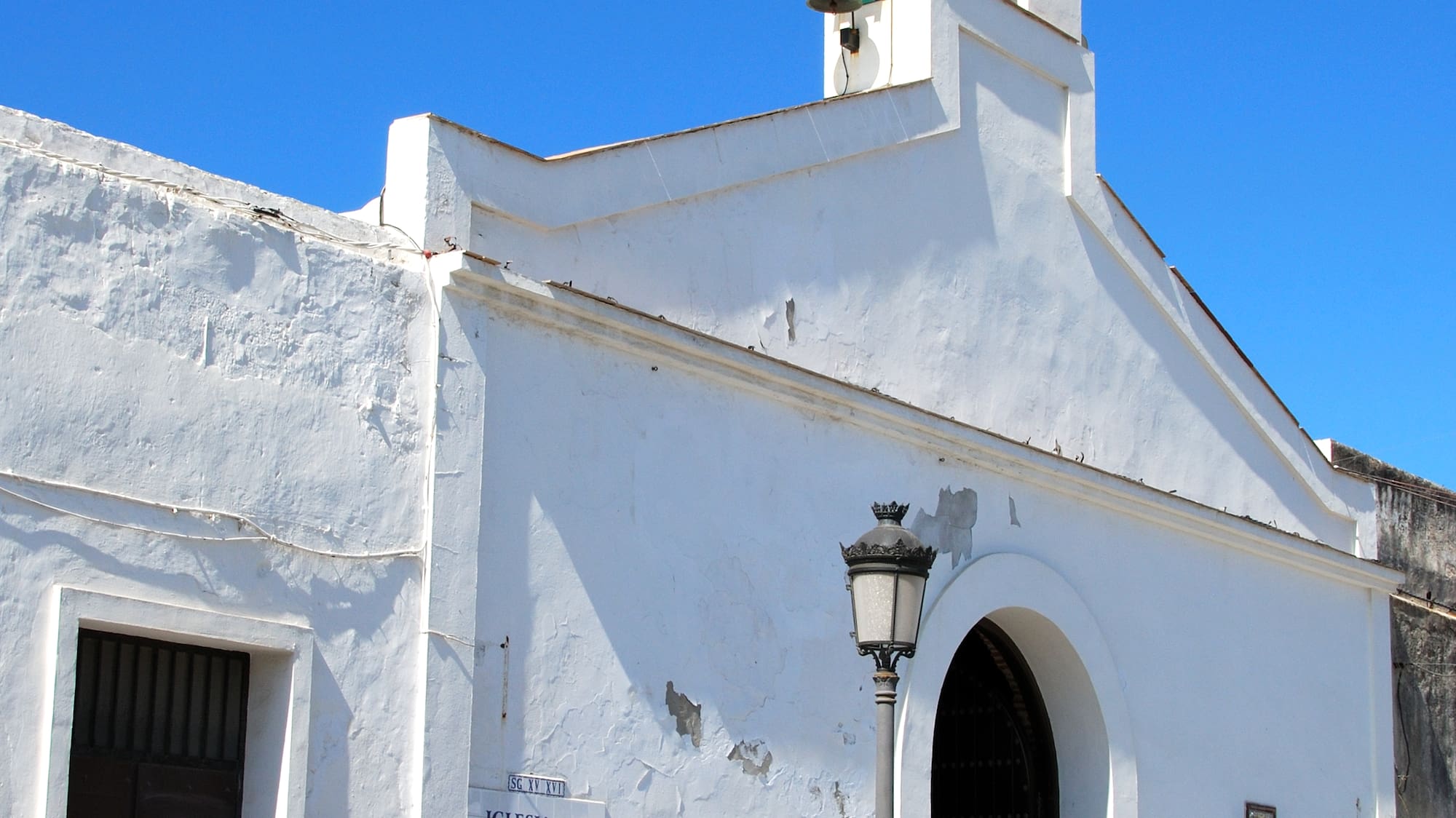 a group of people outside of Church of San Pedro de Atacama