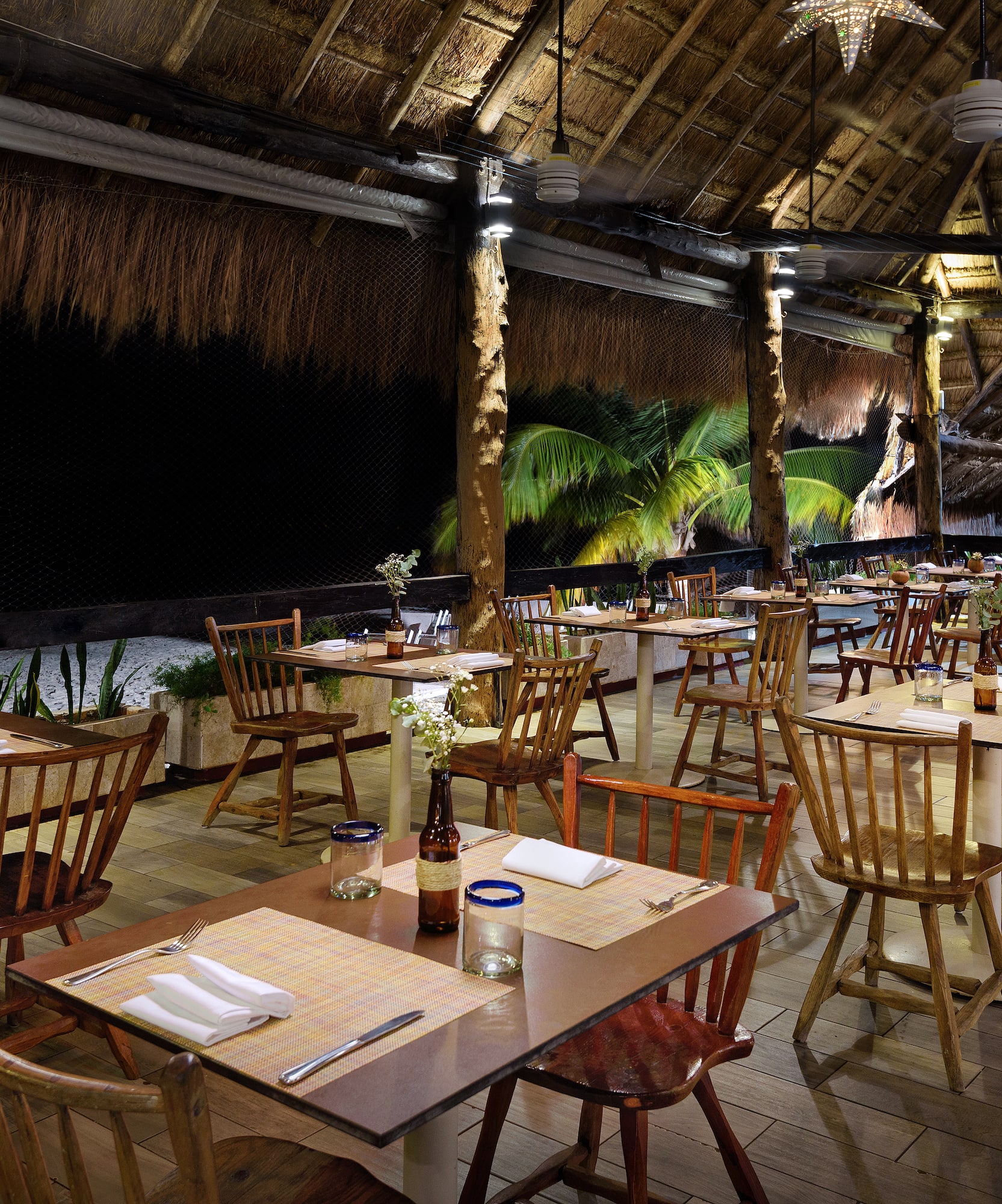 a restaurant with tables and chairs