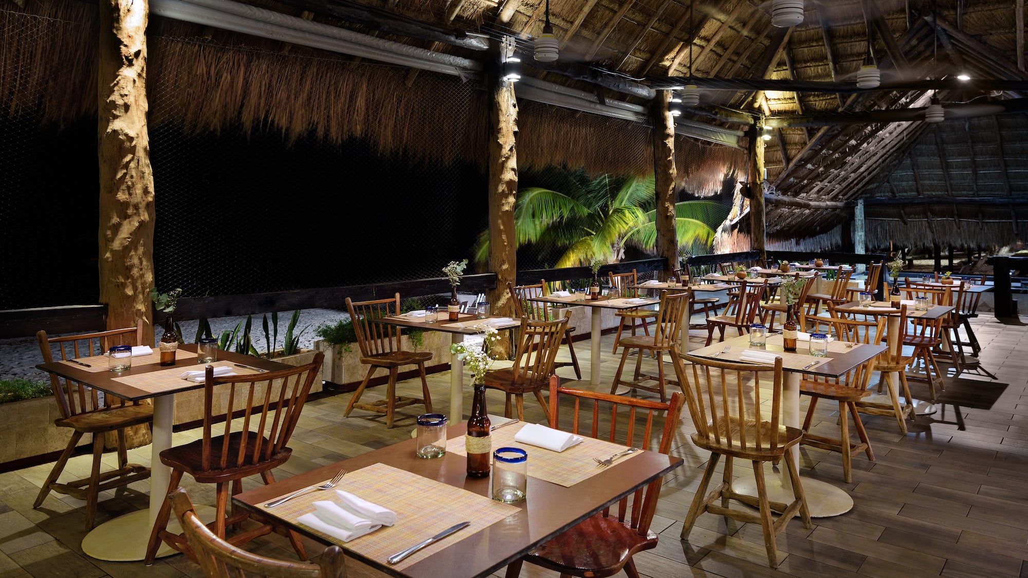 a restaurant with tables and chairs