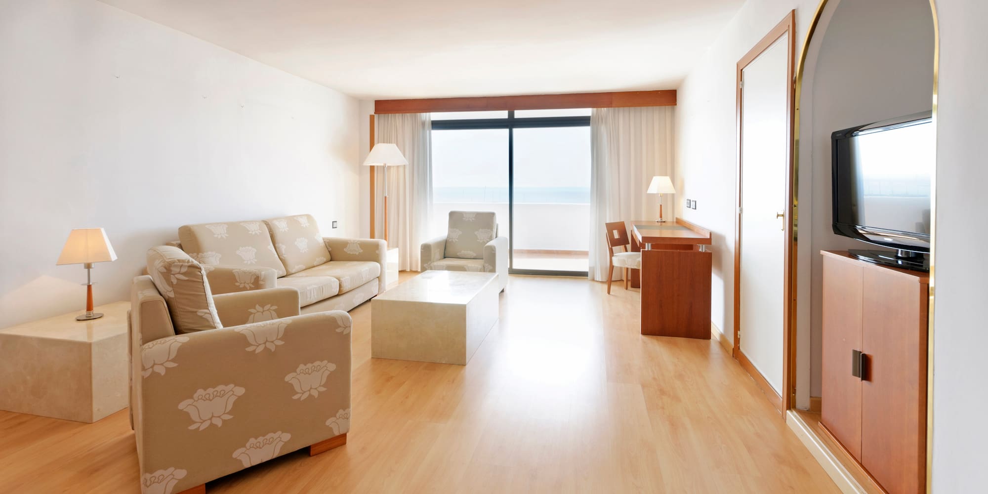 a living room with a couch and a table