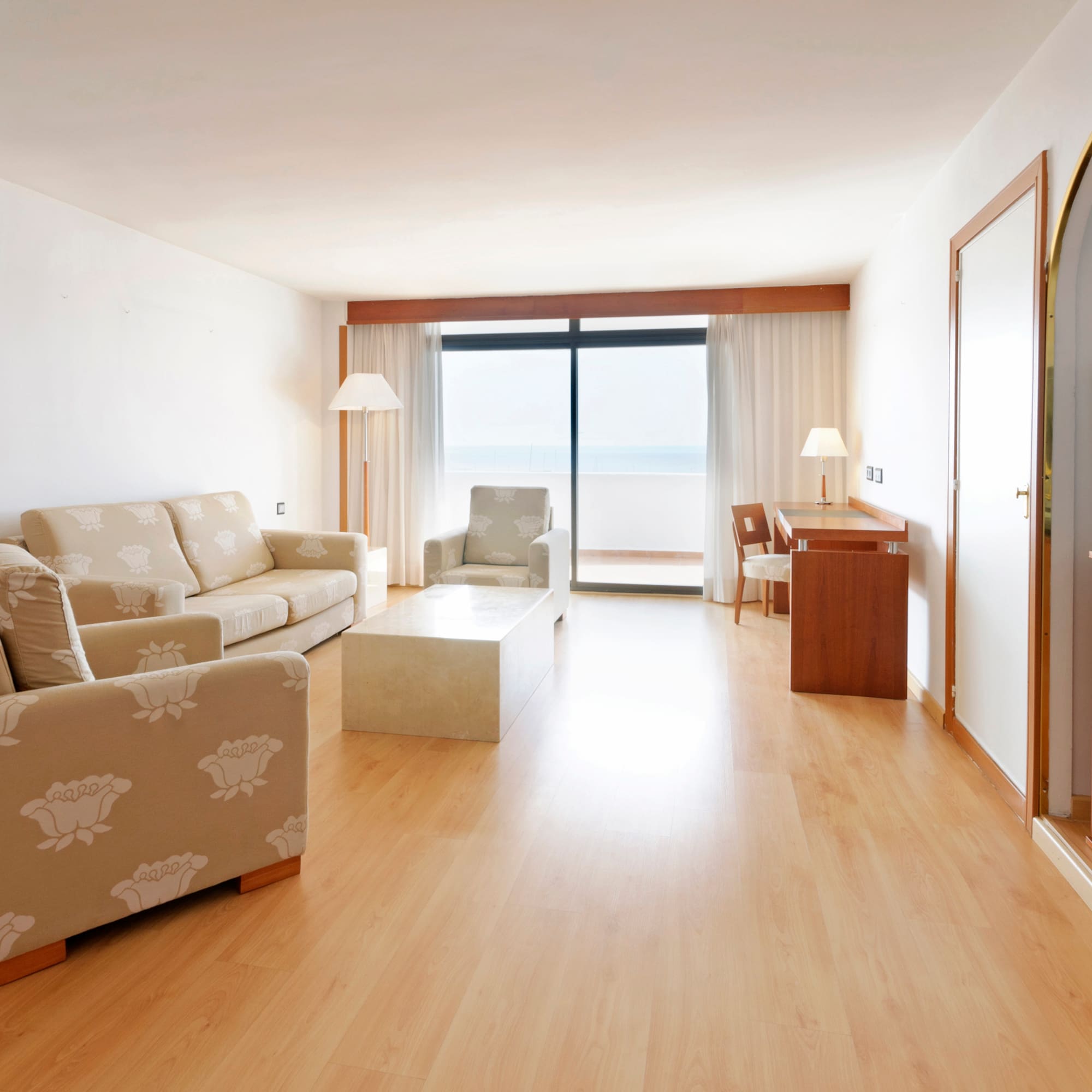 a living room with a couch and a table