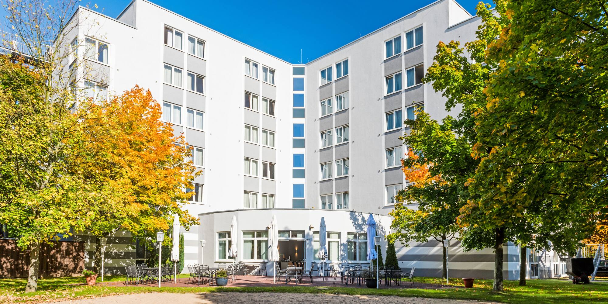 a building with trees in front of it