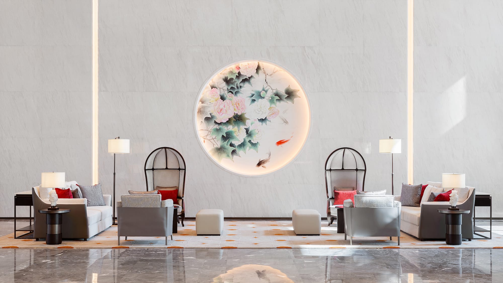 a room with chairs and a round wall